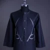 A charcoal black front flap, deer horn embroidery, clear view Swarovski buttons, 3/4 sleeve details, African senator Kaftan native.