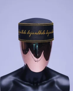 A Charcoal black, gold scritto pattered embroidery hat