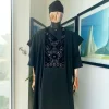 A charcoal black, grommet eyelet on root splash embroidery details agbada