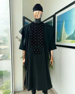 A charcoal black, grommet eyelet on dropping octa embroidery details agbada