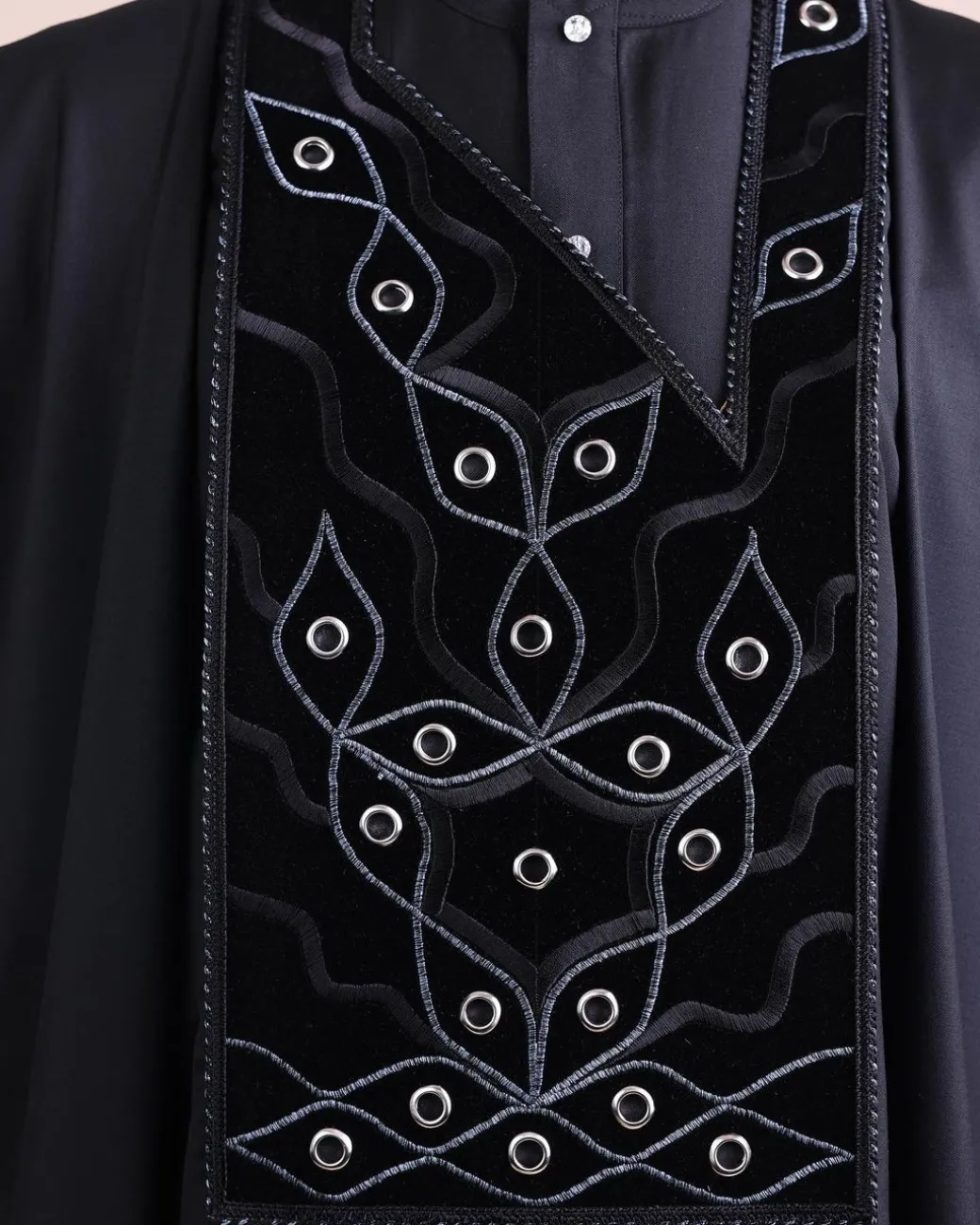A charcoal black, grommet eyelet on root splash embroidery details agbada