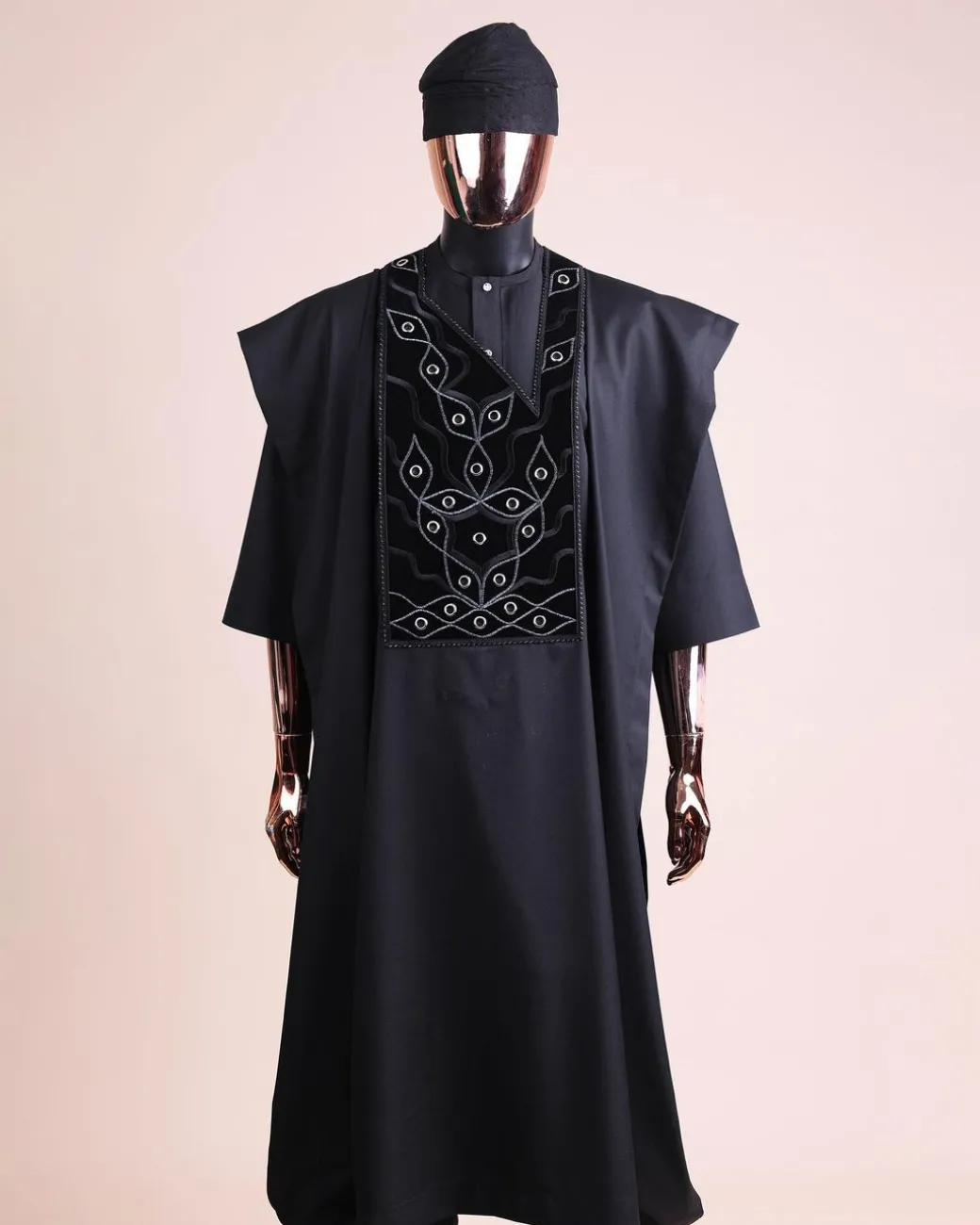A charcoal black, grommet eyelet on root splash embroidery details agbada