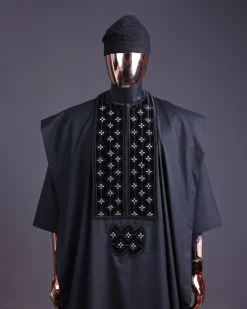 A charcoal black, grommet eyelet on dropping octa with silver Swarovski embroidery details agbada