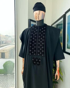 A charcoal black, grommet eyelet on dropping octa embroidery details agbada