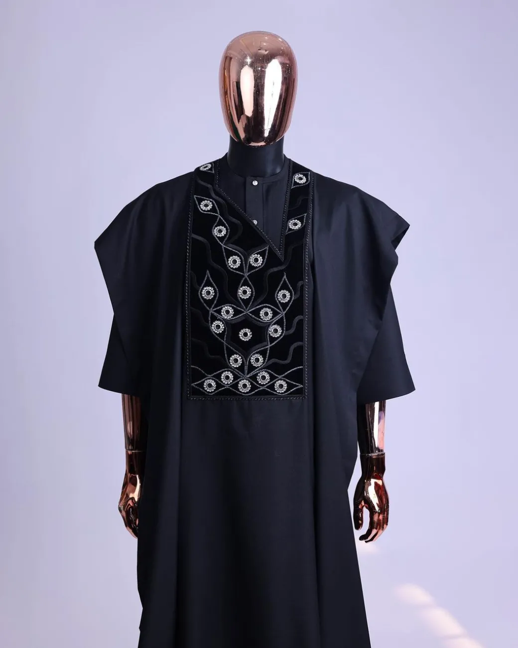A charcoal black, grommet eyelet on root splash embroidery details agbada