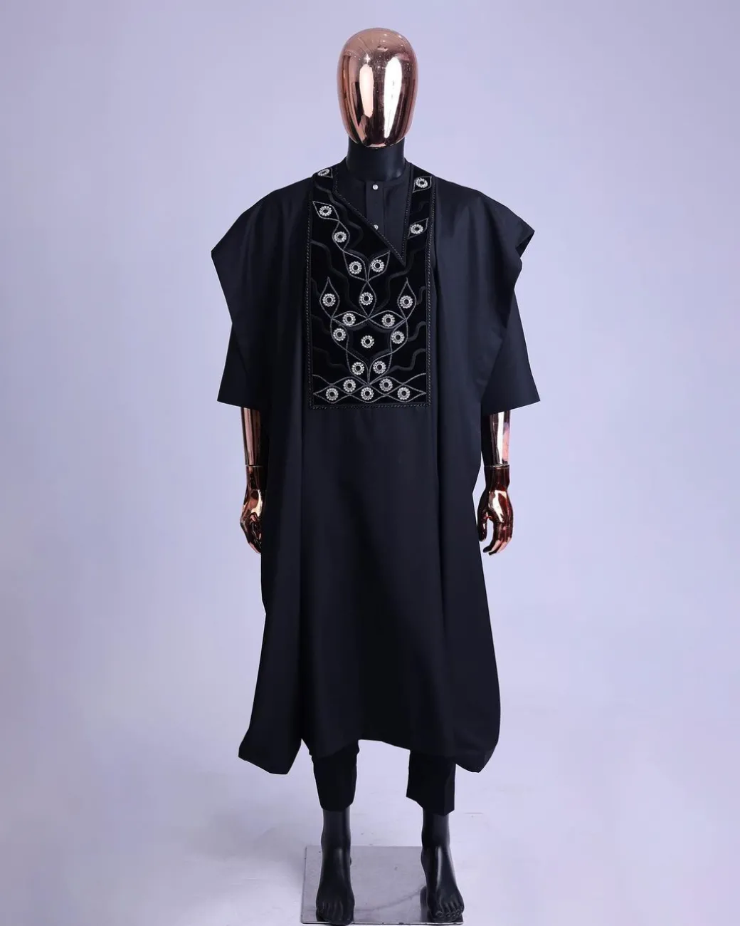 A charcoal black, grommet eyelet on root splash embroidery details agbada