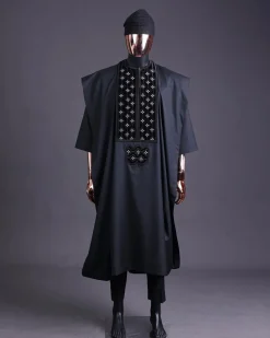 A charcoal black, grommet eyelet on dropping octa with silver Swarovski embroidery details agbada