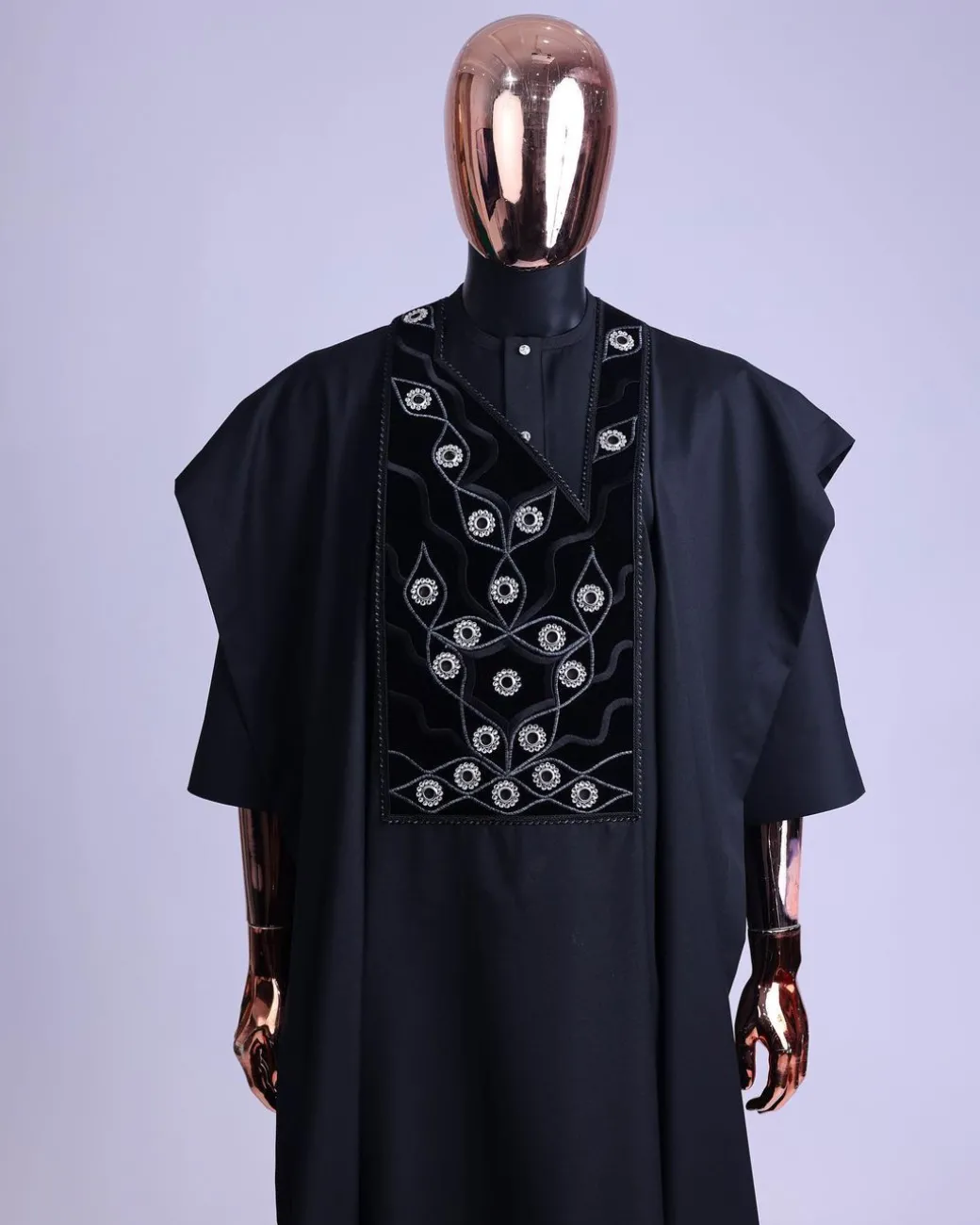 A charcoal black, grommet eyelet on root splash embroidery details agbada