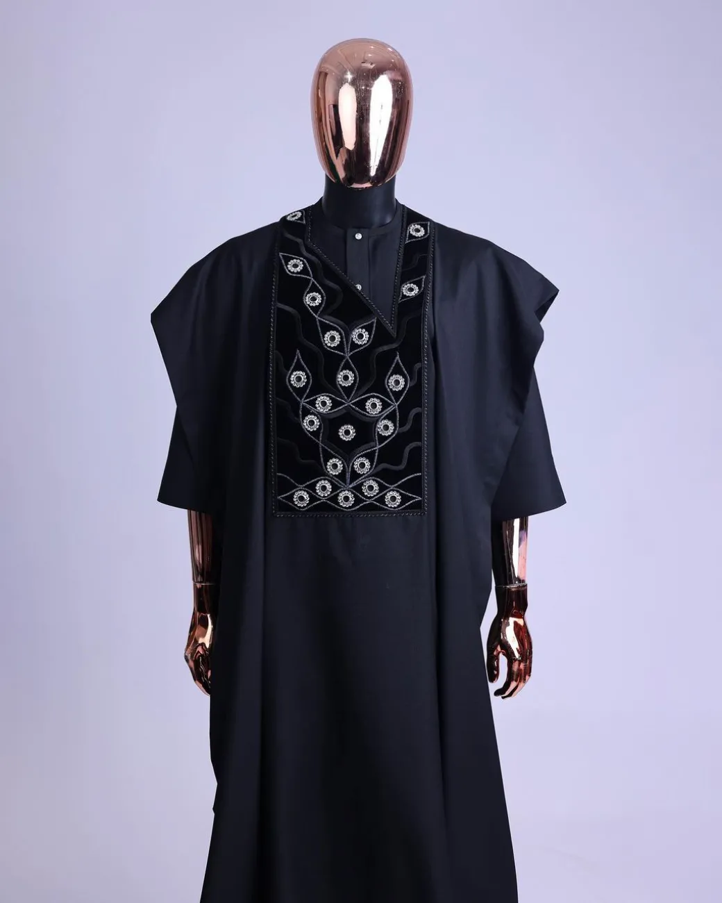 A charcoal black, grommet eyelet on root splash embroidery details agbada