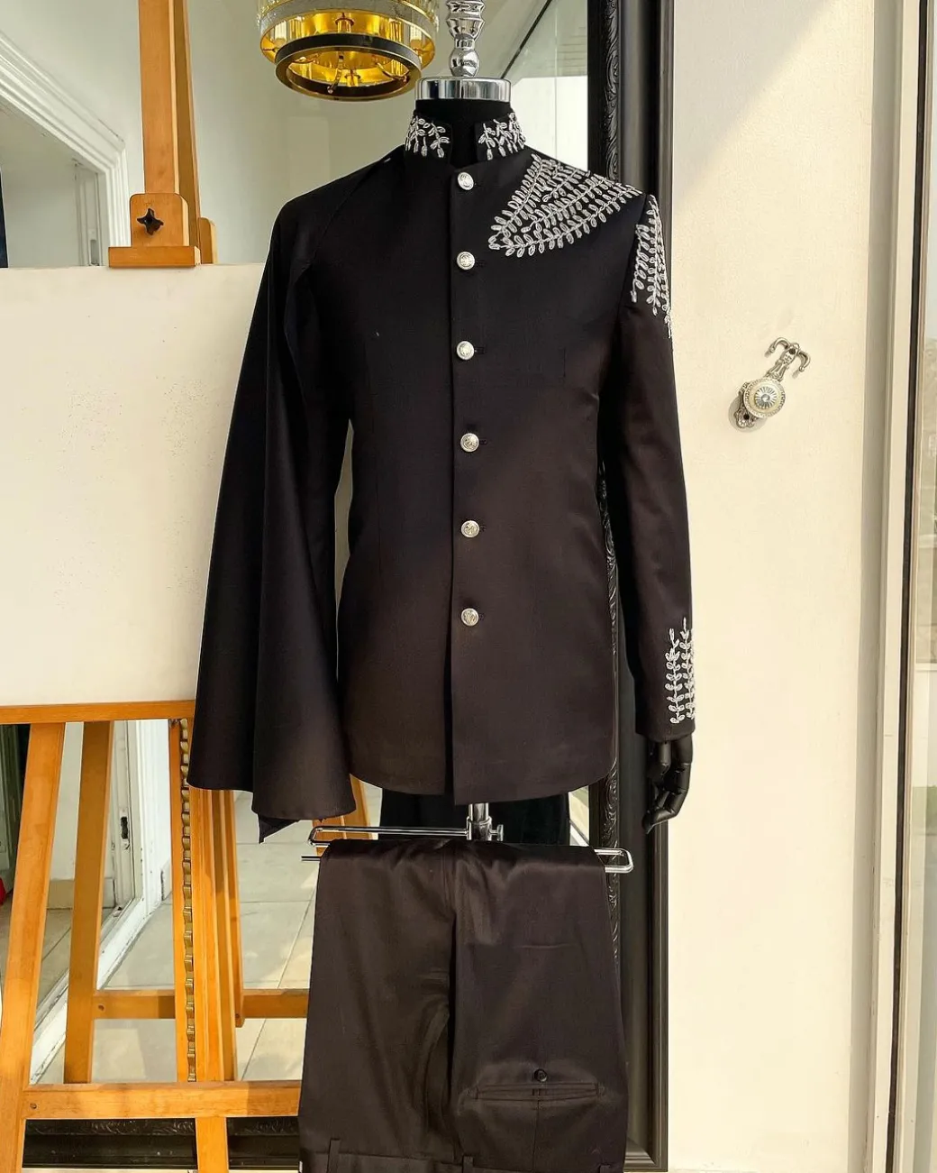 A Charcoal black, hand “Ide” silver metal wire embrodery, right-hand sache safari suit