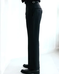 A Charcoal Black High Waist, Trumpet-Cut Details Pant With A Side Metal Adjuster.
