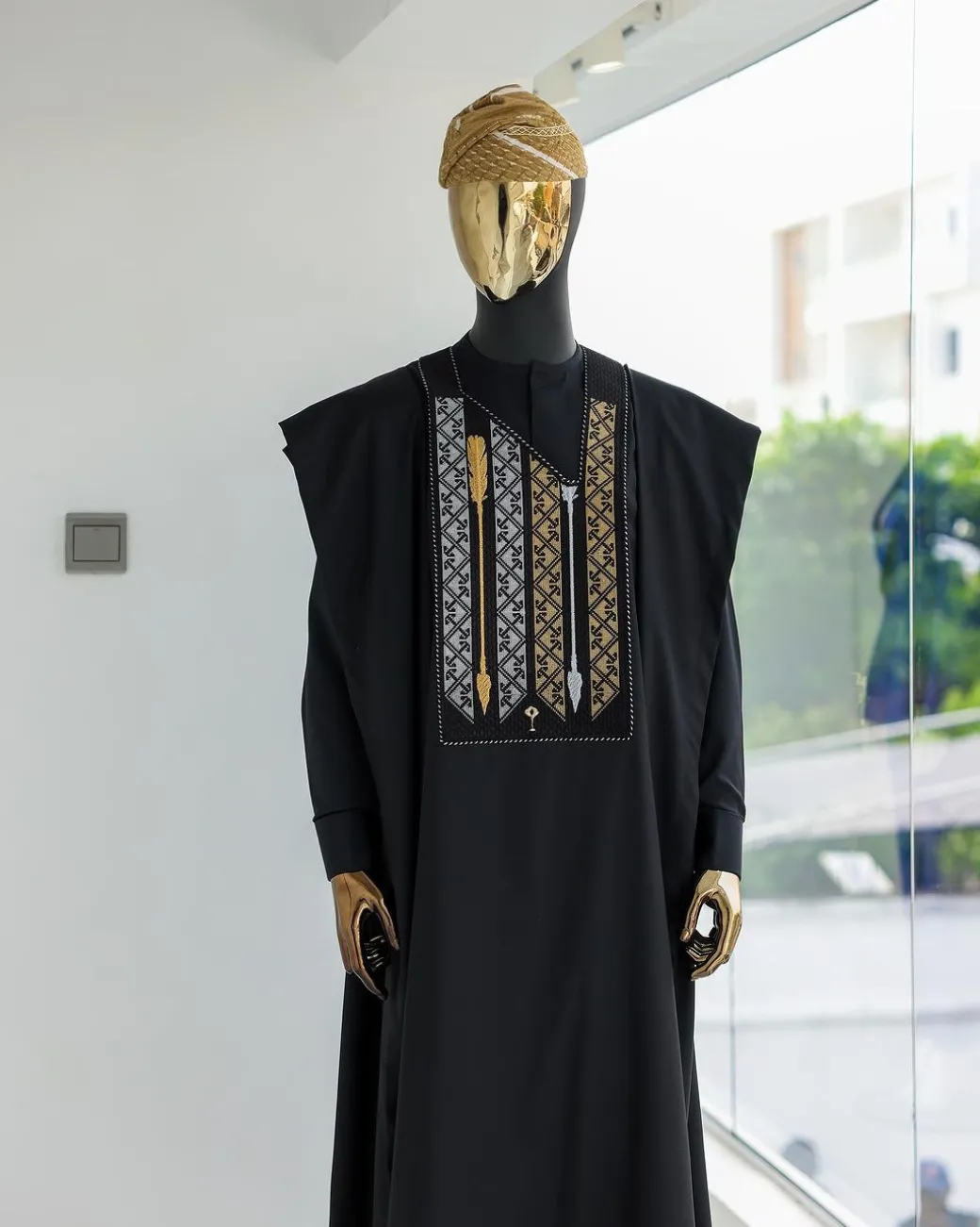 A Charcoal black, inverted arrow and layered square embroidery details agbada