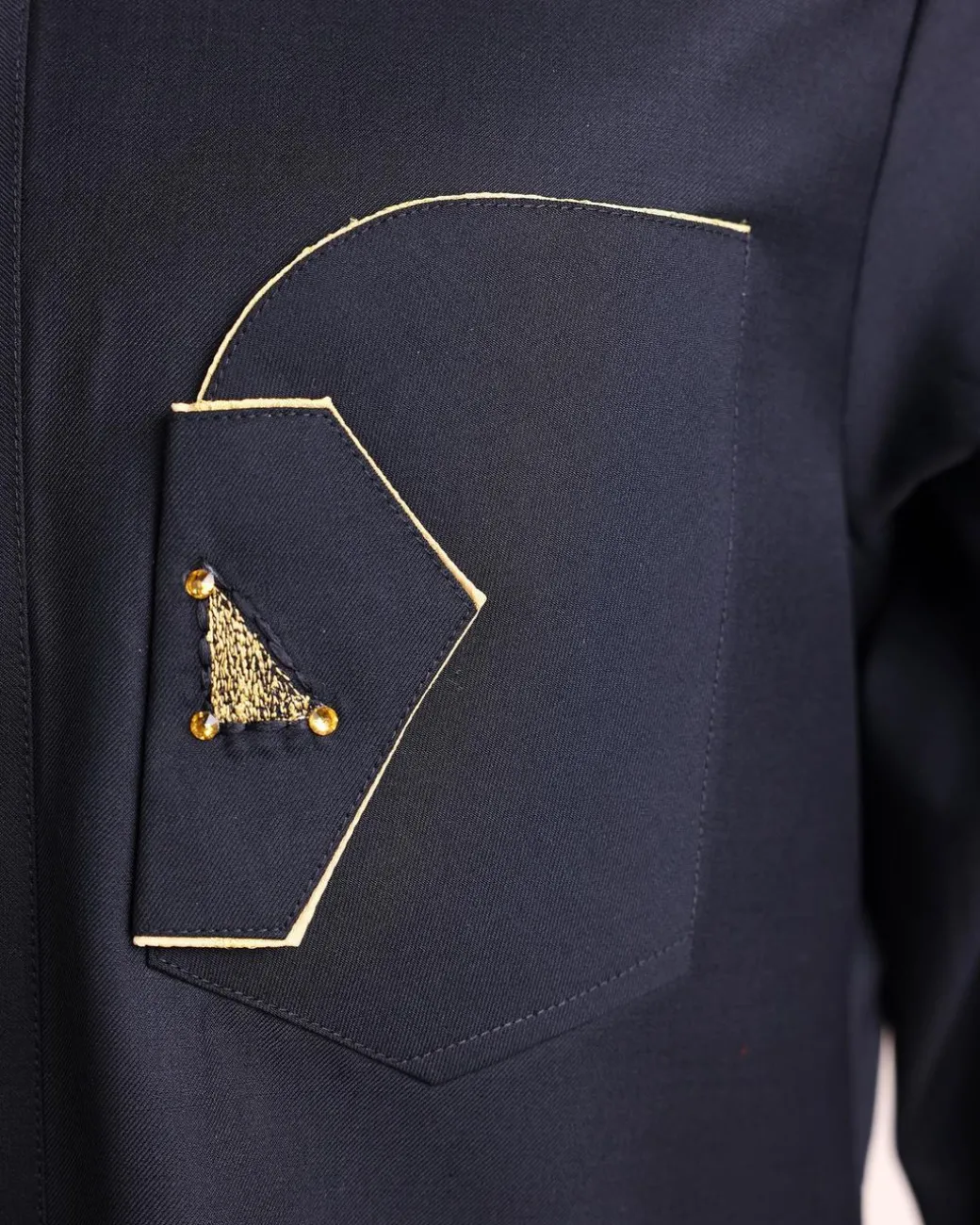 A charcoal black, inverted and closed flap shaped pocket details, 3/4 sleeve African senator kaftan native.