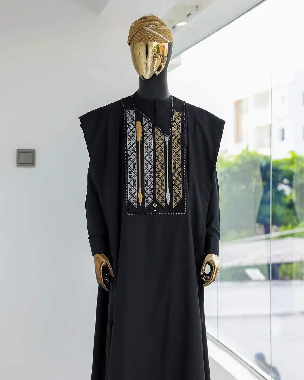 A Charcoal black, inverted arrow and layered square embroidery details agbada