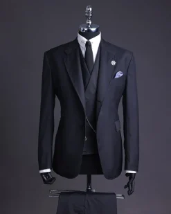A Charcoal black, knitted, notch lapel suit