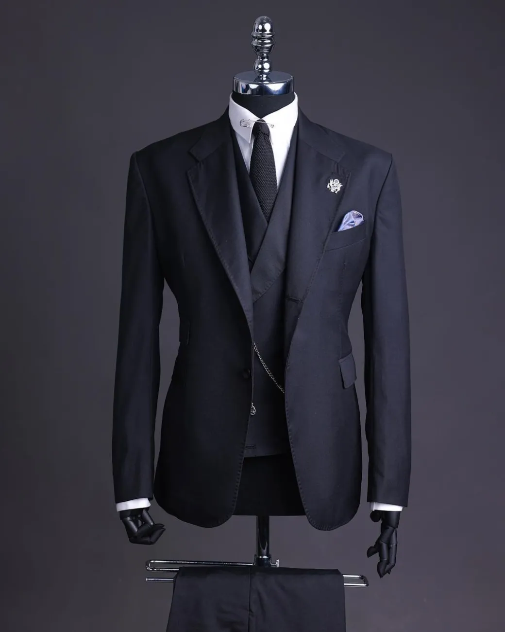 A Charcoal black, knitted, notch lapel suit