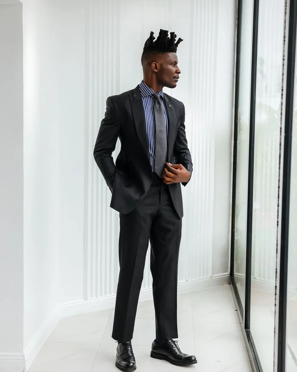 A Charcoal Black, Knitted, Peak Lapel Suit