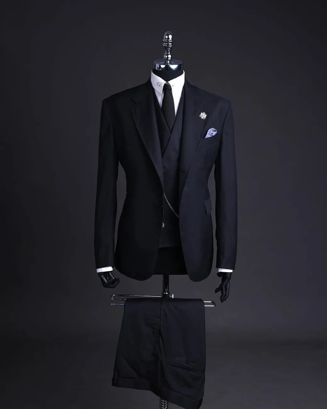 A Charcoal black, knitted, notch lapel suit