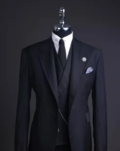 A Charcoal black, knitted, notch lapel suit