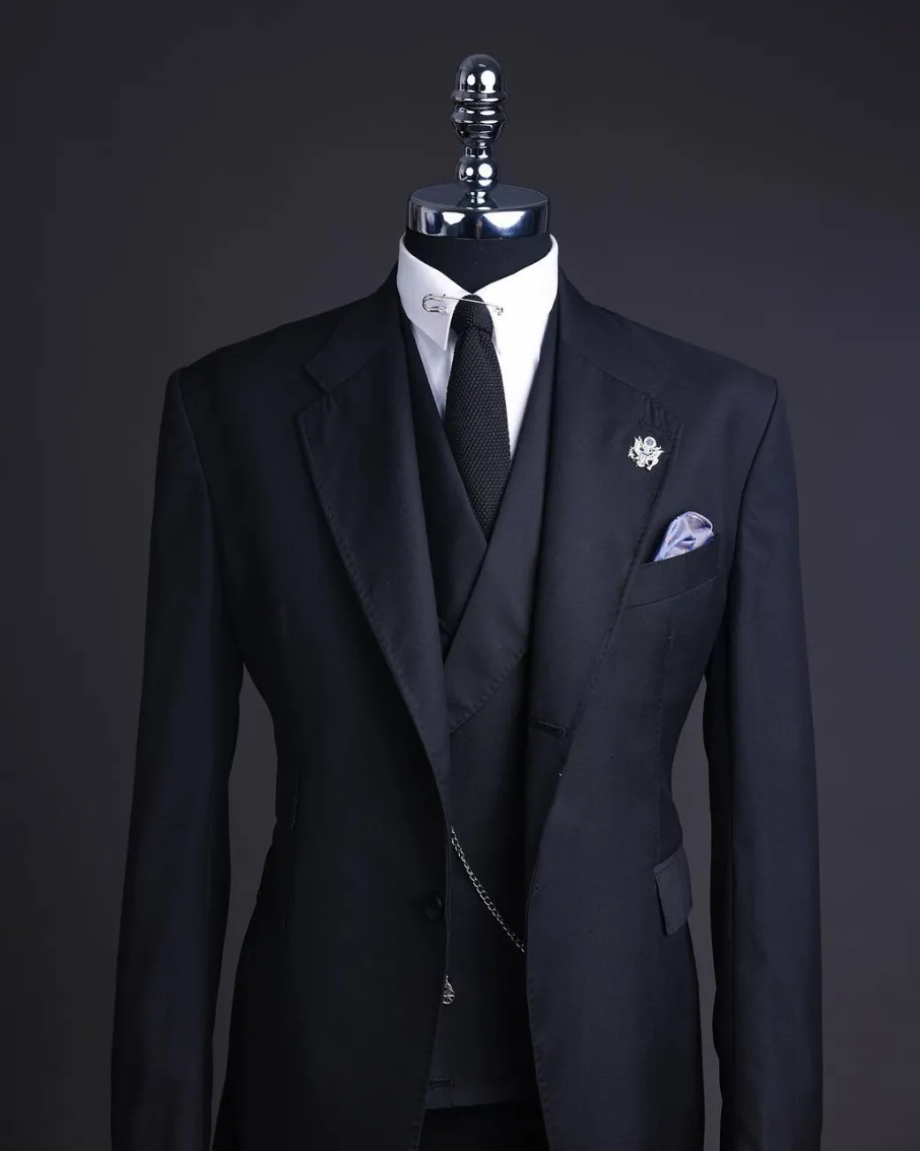 A Charcoal black, knitted, notch lapel suit