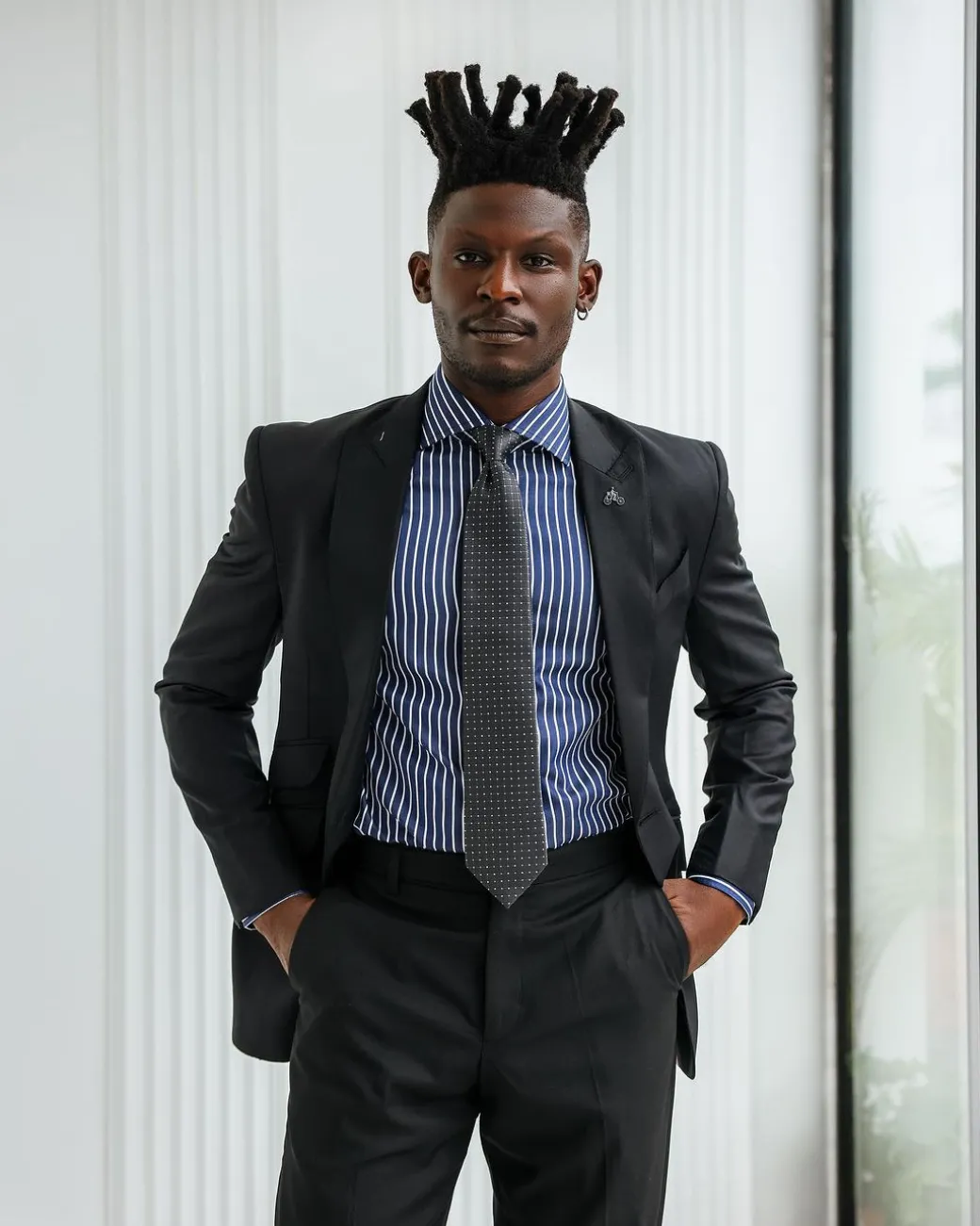 A Charcoal Black, Knitted, Peak Lapel Suit