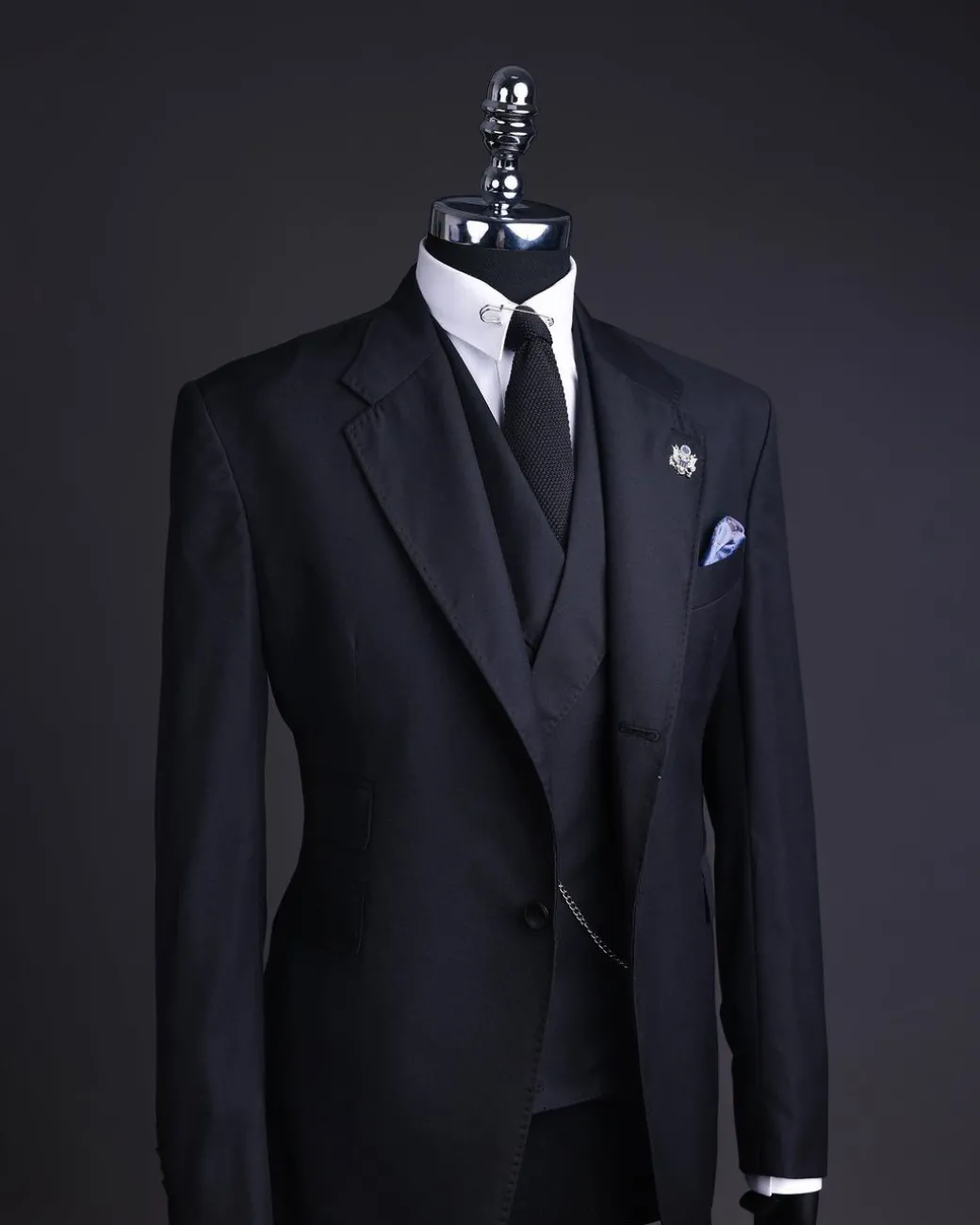A Charcoal black, knitted, notch lapel suit