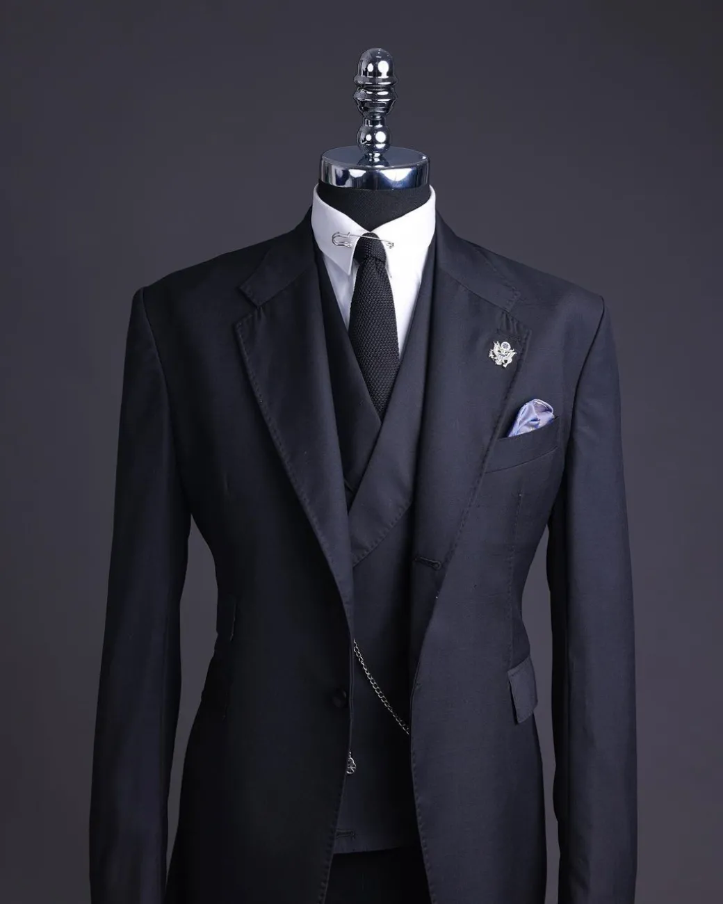 A Charcoal black, knitted, notch lapel suit