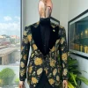 A Charcoal Black, Lemon Green, Orange Mix Metallic Floral Jacquard, Peak Lapel Tuxedo Suit.