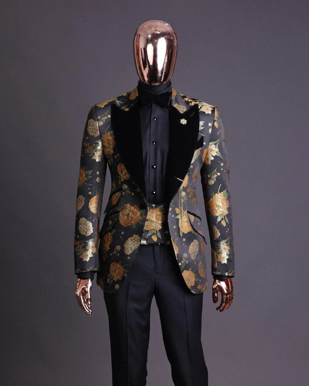 A Charcoal Black, Lemon Green, Orange Mix Metallic Floral Jacquard, Peak Lapel Tuxedo Suit.