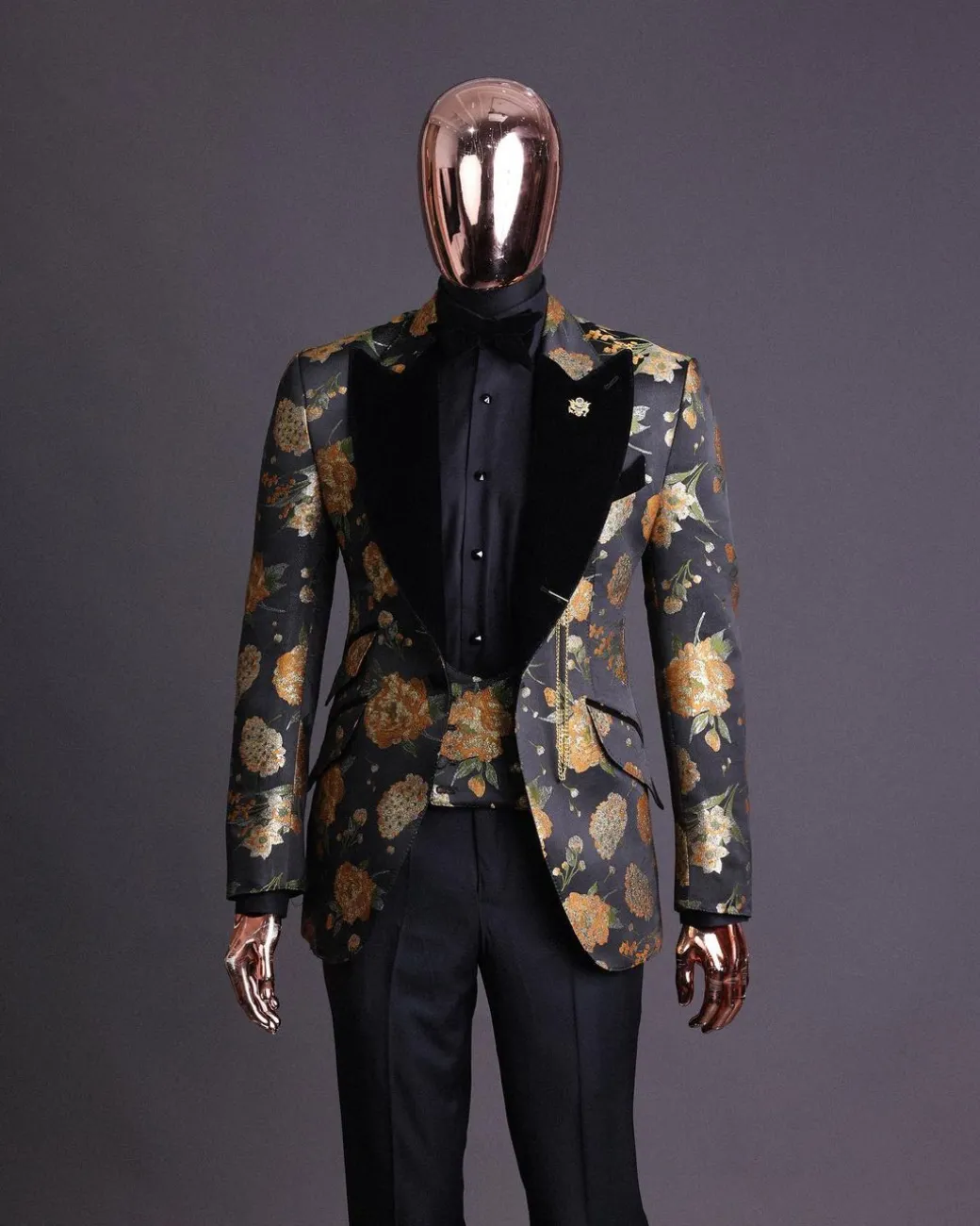 A Charcoal Black, Lemon Green, Orange Mix Metallic Floral Jacquard, Peak Lapel Tuxedo Suit.