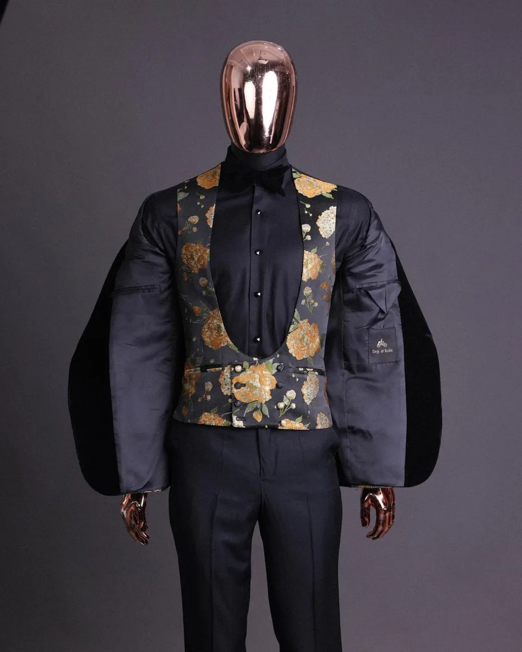 A Charcoal Black, Lemon Green, Orange Mix Metallic Floral Jacquard, Peak Lapel Tuxedo Suit.