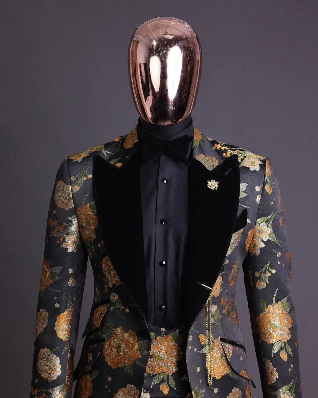 A Charcoal Black, Lemon Green, Orange Mix Metallic Floral Jacquard, Peak Lapel Tuxedo Suit.