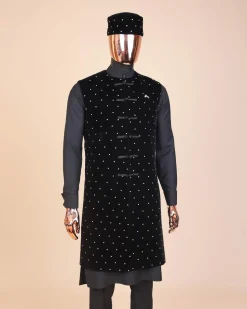 A Charcoal black long sleeve kaftan, Matching velvet jacket , hat and sokoto African traditional senator kaftan native.