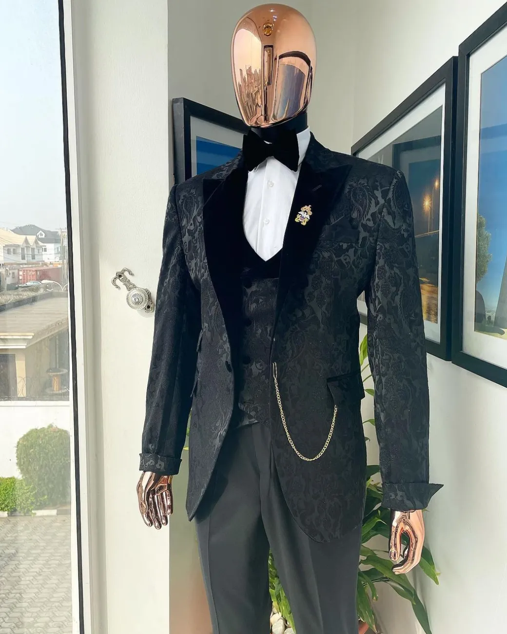 A Charcoal black, mandarin floral pattern with gold detailing metallic Jacquard velvet peak lapel tuxedo suit