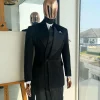 A Charcoal Black “Mandate” rain drop patterned jacquard, triple breasted, 2 layer dropping sache tuxedo suit.