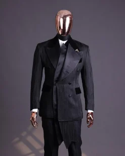 A Charcoal Black “Mandate” rain drop patterned jacquard, triple breasted, 2 layer dropping sache tuxedo suit.
