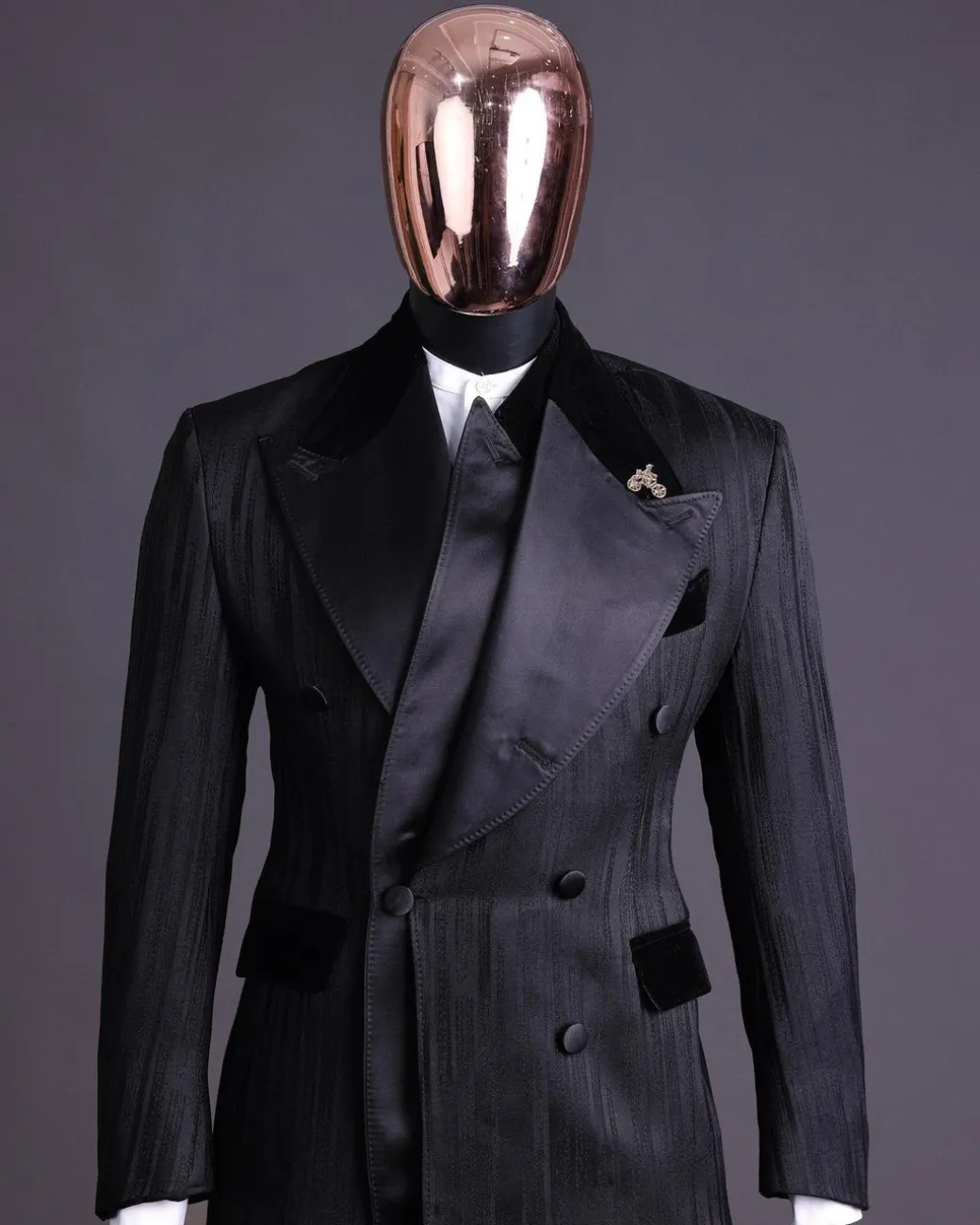 A Charcoal Black “Mandate” rain drop patterned jacquard, triple breasted tuxedo suit