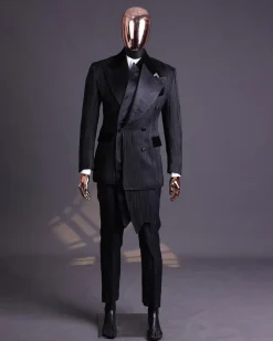 A Charcoal Black “Mandate” rain drop patterned jacquard, triple breasted, 2 layer dropping sache tuxedo suit.