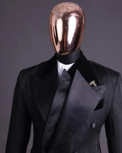 A Charcoal Black “Mandate” rain drop patterned jacquard, triple breasted, 2 layer dropping sache tuxedo suit.