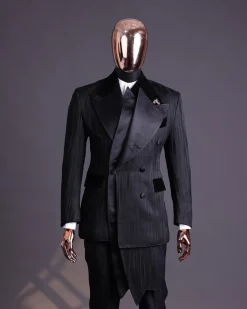 A Charcoal Black “Mandate” rain drop patterned jacquard, triple breasted, 2 layer dropping sache tuxedo suit.