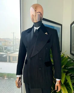 A Charcoal Black “Mandate” rain drop patterned jacquard, triple breasted, 2 layer dropping sache tuxedo suit.
