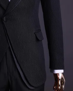 A Charcoal black, mushroom pattern jacquard, notch lapel tuxedo suit.