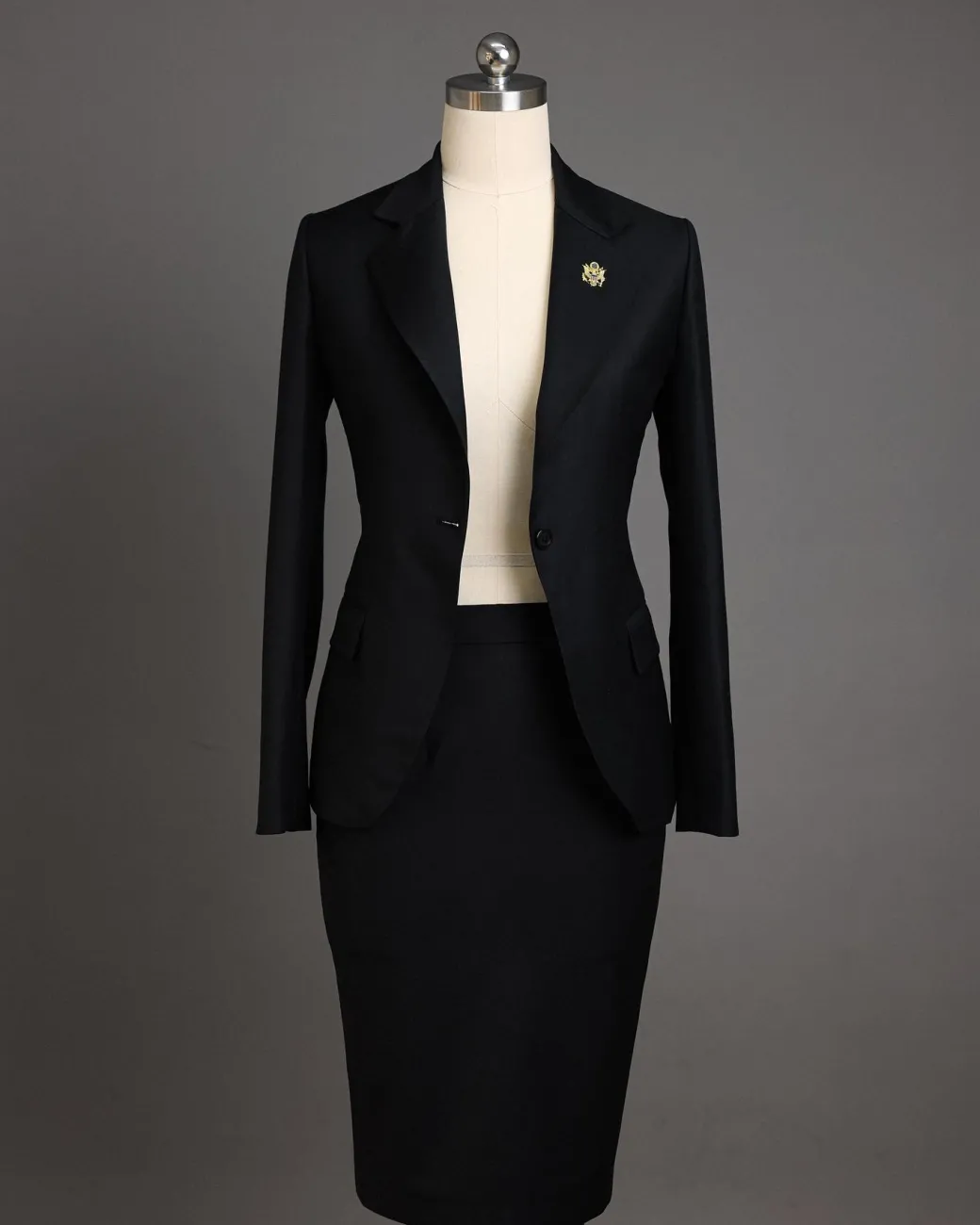 A Charcoal Black Notch Lapel Suit.