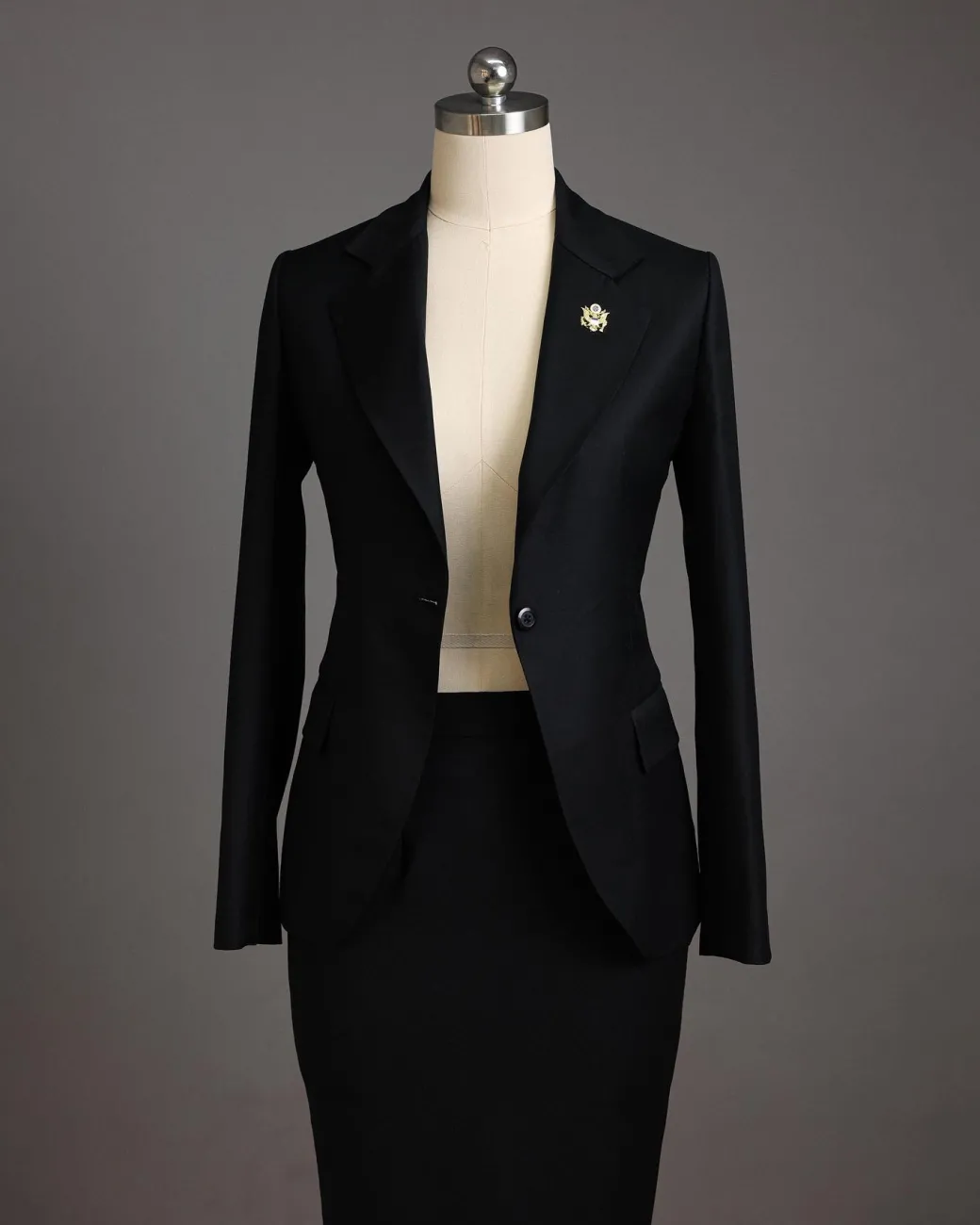 A Charcoal Black Notch Lapel Suit.