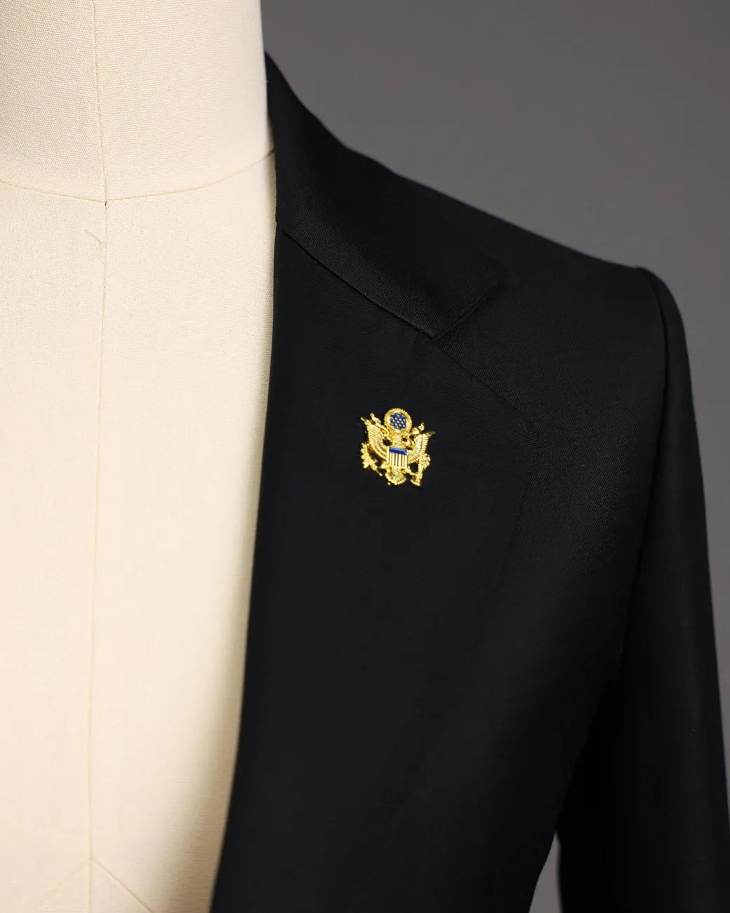 A Charcoal Black Notch Lapel Suit.