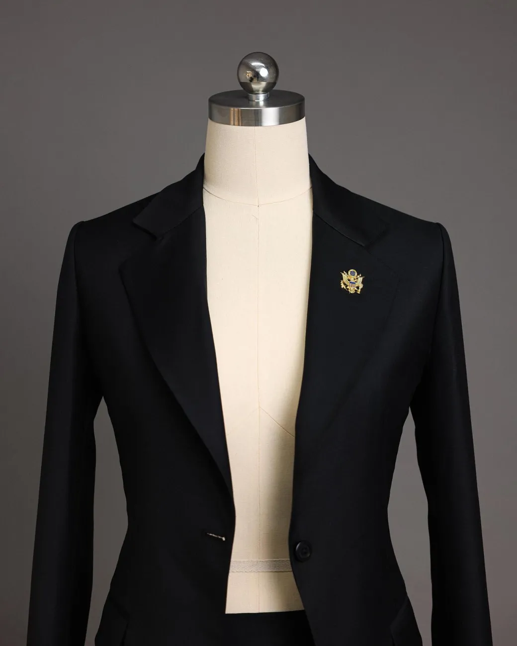 A Charcoal Black Notch Lapel Suit.