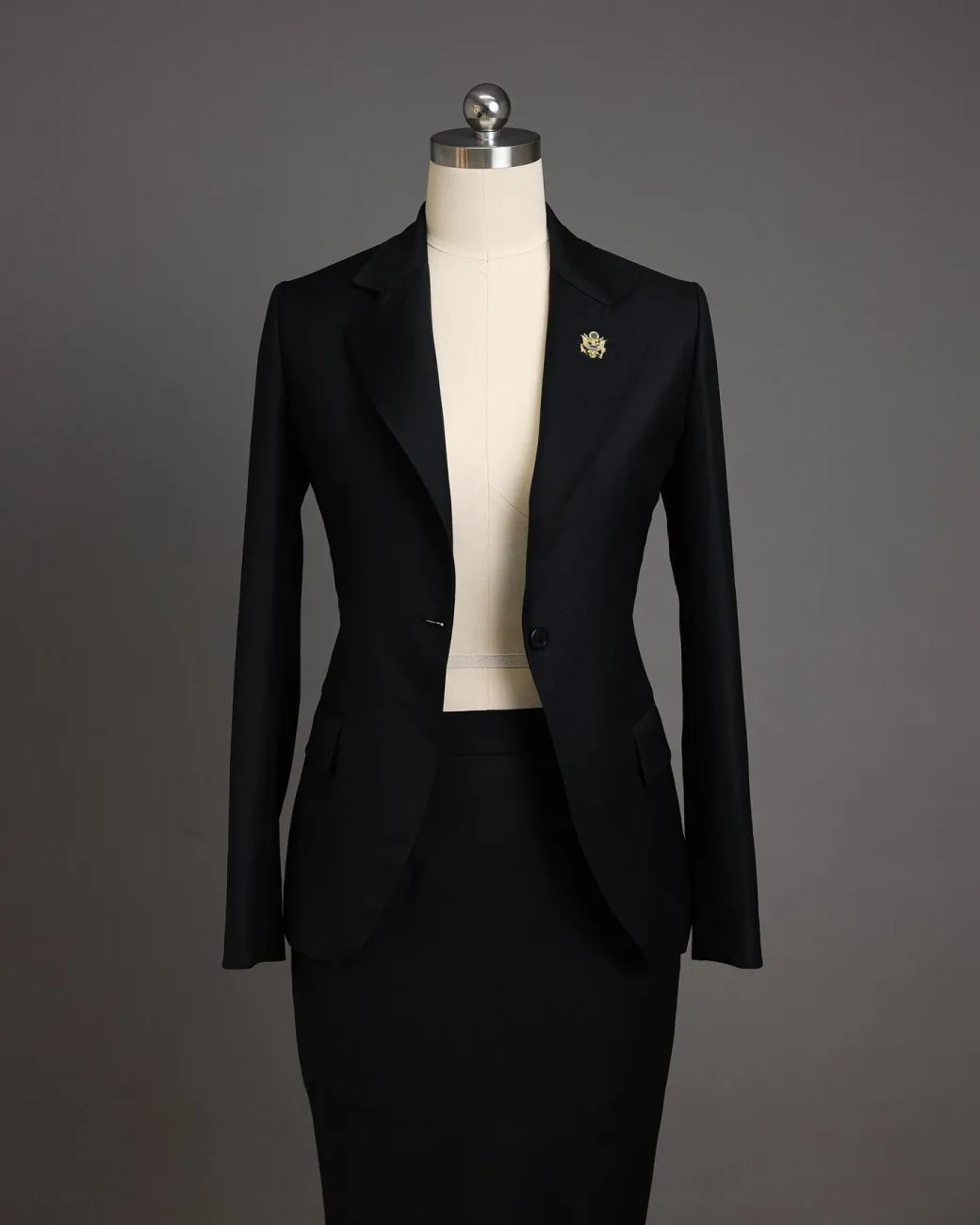 A Charcoal Black Notch Lapel Suit.