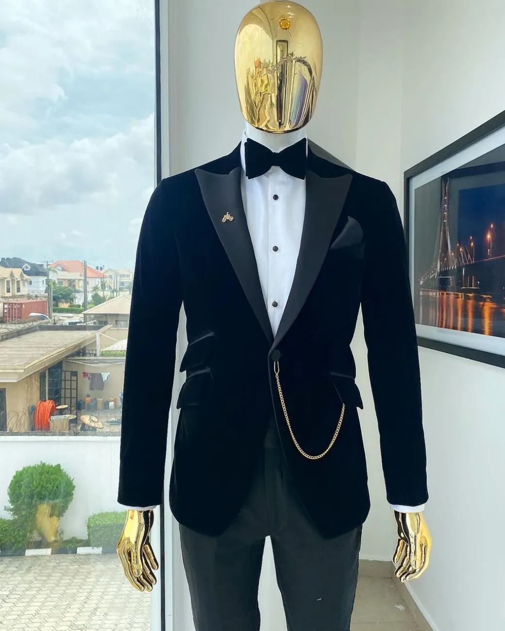 A Charcoal black peak lapel-soaked Italian velvet tuxedo suit