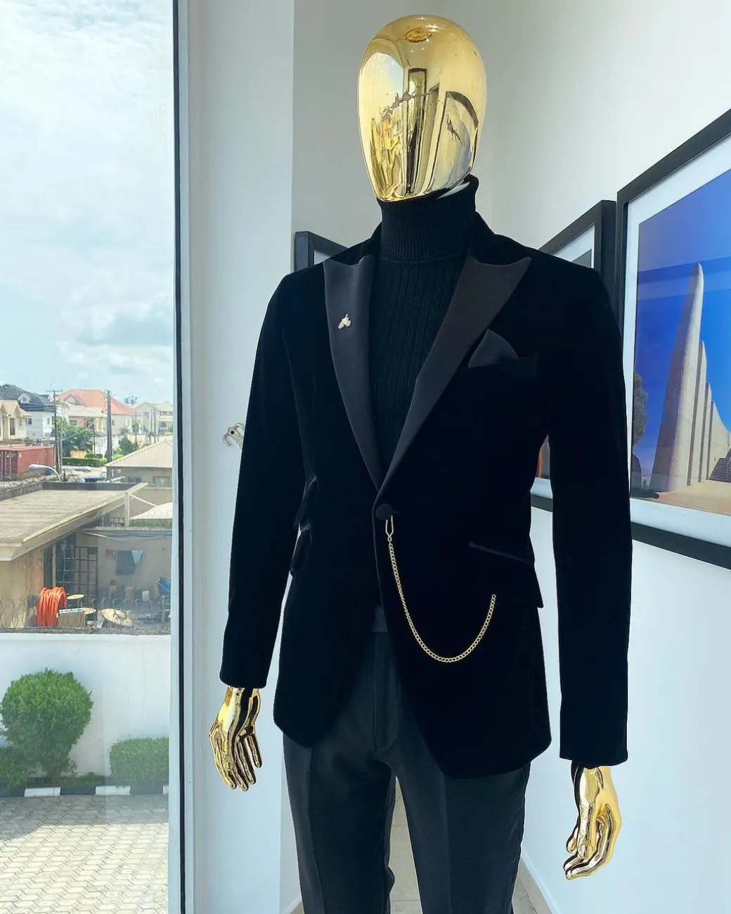 A charcoal black peak lapel soaked Italian velvet tuxedo suit