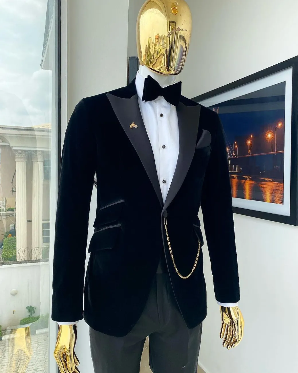 A Charcoal black peak lapel-soaked Italian velvet tuxedo suit